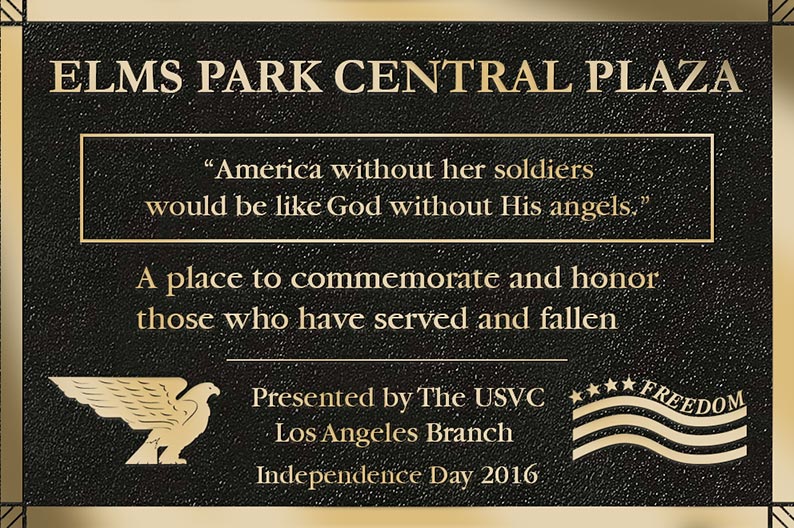 Bronze military memorial plaque honoring patriots with engraved soldier silhouette and American flag