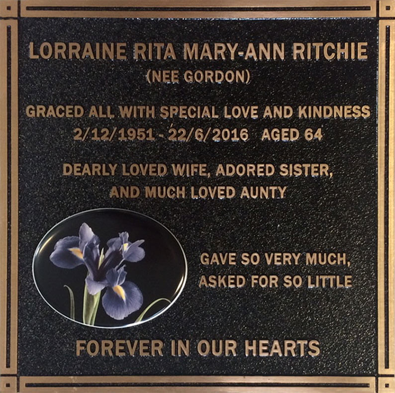 Bronze plaque with integrated ceramic photo inset, custom engraved text, and classic border—ideal for memorials and cemetery tributes.