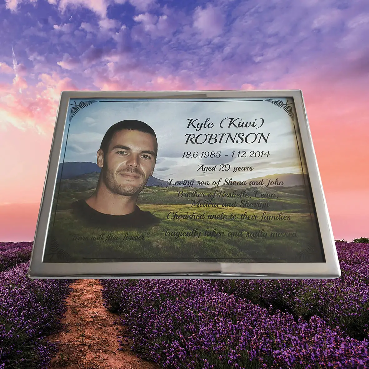 Full-colour memorial plaque featuring a printed photograph, name, and tribute message—designed for long-lasting outdoor display on walls, stones, or headstones.