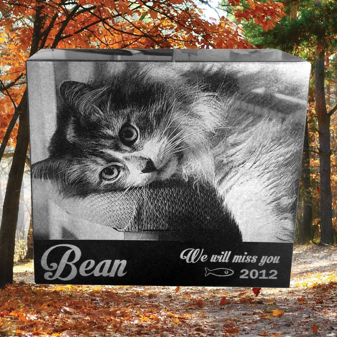 Laser-etched pet rock memorial with engraved photo, name, and tribute text—designed for outdoor placement in gardens or pet remembrance areas.