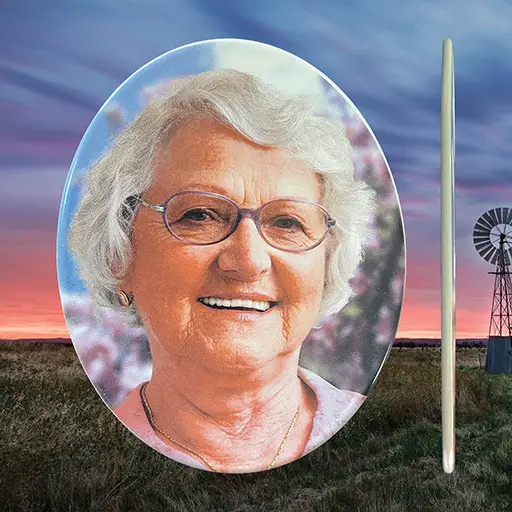 Ceramic photo tiles featuring high-resolution printed images, designed for permanent installation on memorial plaques, headstones, or outdoor tribute walls.